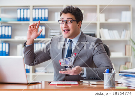 Businessman in online shopping concept Businessman in online shopping concept 29554774