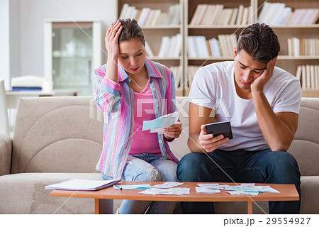 Young family discussing family finances 29554927