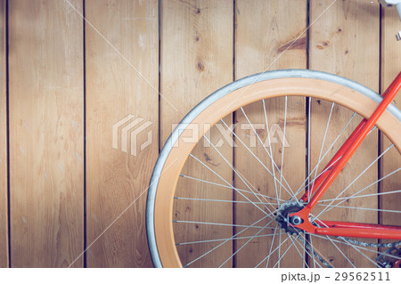 bicycle parked with wood wall, close up image bicycle parked with wood wall, close up image 29562511