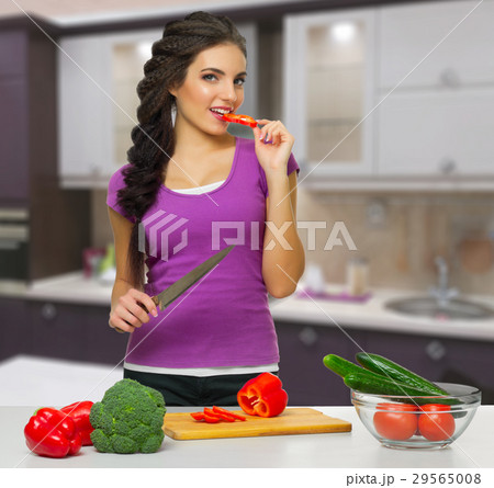 Cooking woman at kitchen Cooking woman at kitchen 29565008