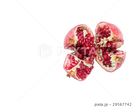 Ripe pomegranate fruit on a white background Ripe pomegranate fruit on a white background 29567742