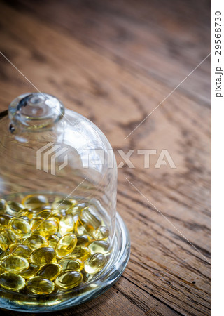 Omega-3 capsules under the glass dome 29568730