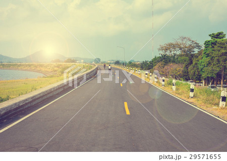 Cyclist riding bicycle in the morning 29571655