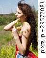 girl in the country among wildflowers 29572081