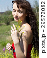 girl in the country among wildflowers 29572082