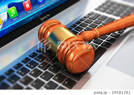 Wooden mallet on laptop keyboard 29581761