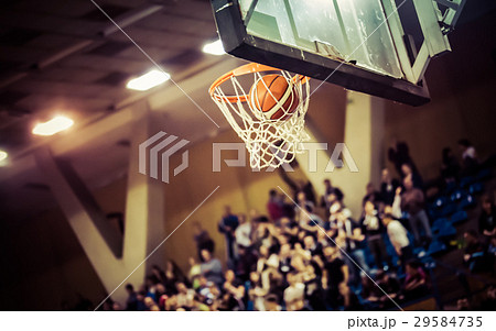 blurred crowd of people in a basketball court 29584735