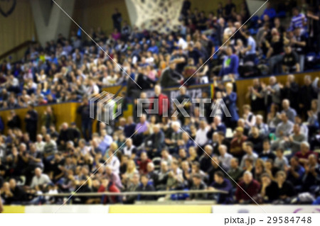 blurred crowd of people in a basketball court 29584748