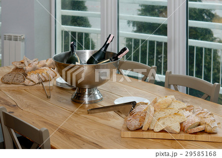 table with cutted bread on wooden board table with cutted bread on wooden board 29585168