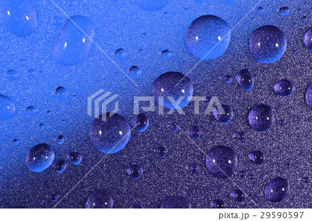 Water drops on colored background. Selective focus Water drops on colored background. Selective focus 29590597