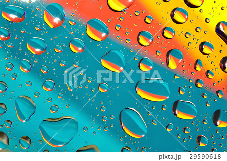 Water drops on multicolor background Water drops on multicolor background 29590618