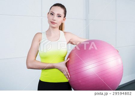 Young woman training at fitness club 29594802