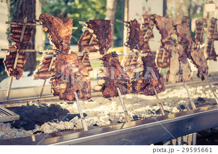 Argentinian asado roasted lamb grilled meat.  29595661