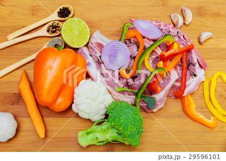 raw pork in marinade, on a cutting board  29596101