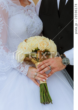 closeup of hands bridal couple with wedding rings closeup of hands bridal couple with wedding rings 29596174