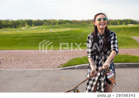 The woman is with skate 29598343