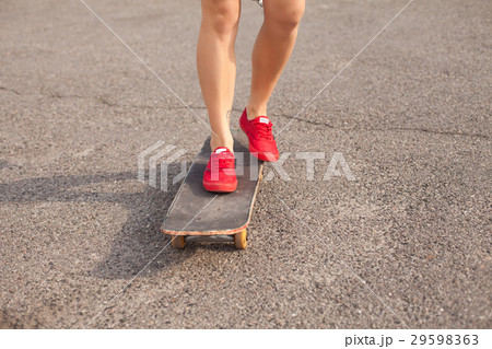 The woman is skating 29598363