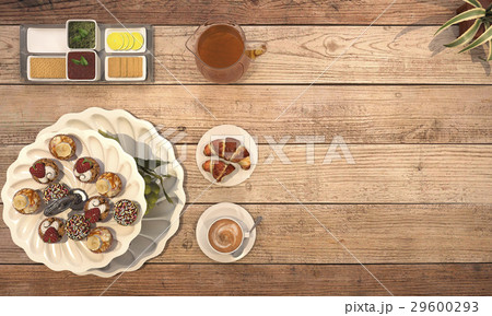 nice meal consist of pastry and coffee  29600293