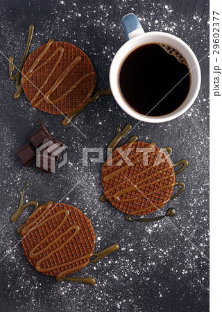 Stroopwafels with caramel sauce and coffee 29602377