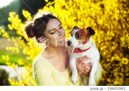 Beautiful young brunette woman enjoying in park Beautiful young brunette woman enjoying in park 29603961