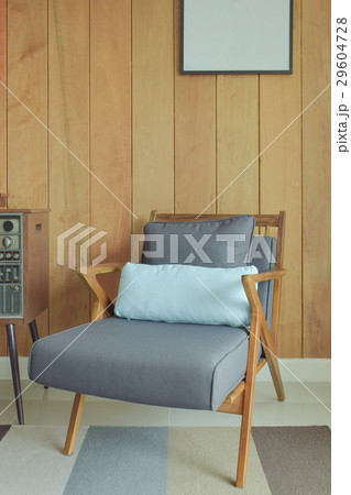 Easy lounge chair with wooden wall background Easy lounge chair with wooden wall background 29604728