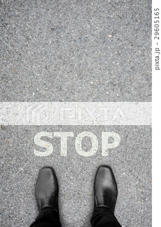 Black shoes standing at the STOP line Black shoes standing at the STOP line 29605165