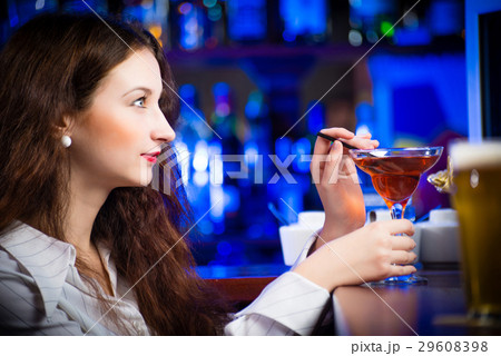 young woman in a bar young woman in a bar 29608398