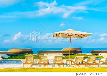 Umbrella and chair with sea view Umbrella and chair with sea view 29614159