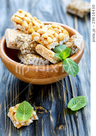 Honey bars with peanuts, sesame and sunflower seed Honey bars with peanuts, sesame and sunflower seed 29616430