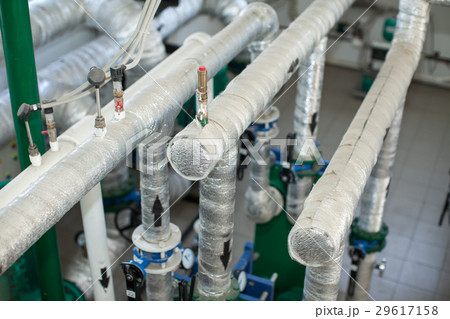 Pipes in a boiler room. Isolation of pipes. Water Pipes in a boiler room. Isolation of pipes. Water 29617158