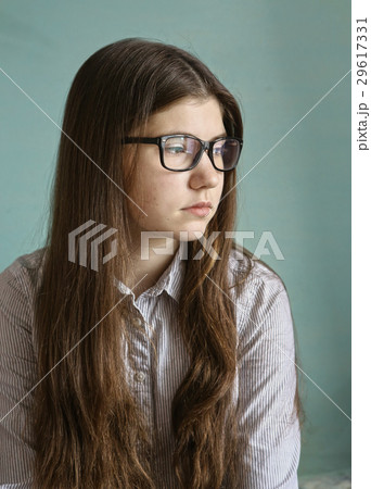 teenager girl in myopia glasses 29617331