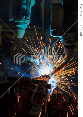 Robot welding automotive part in factory 29617353