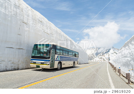Blur windshield bus move along snow wall at japan 29619320