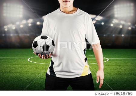 player holding ball with stadium background player holding ball with stadium background 29619760