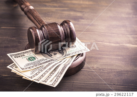 Gavel and dollars banknotes on table Gavel and dollars banknotes on table 29622117