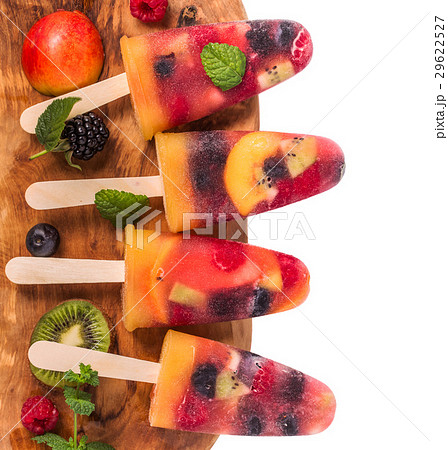 Homemade berry and fruit ice pop top view 29622527