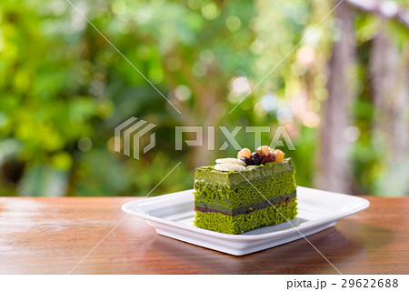Green tea layer cake with mix berries currant. 29622688