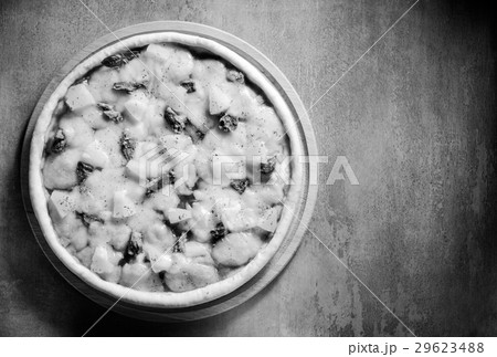 italian pizza at table surface 29623488