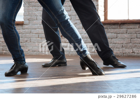 Talented dance couch teaching aging man at the 29627286
