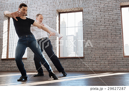 Charismatic dance couch teaching aging man tango Charismatic dance couch teaching aging man tango 29627287