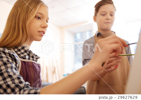 Involved kids painting in the art school 29627629