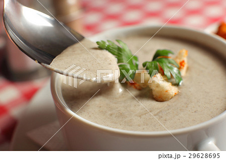 Bowl of cream soup with champignon mushrooms on Bowl of cream soup with champignon mushrooms on 29628695