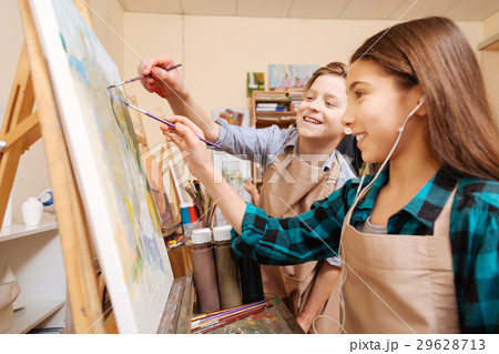 Smiling kids having fun during the lesson 29628713