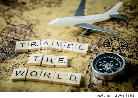 Travel the world concept text and equipment on map 29634561