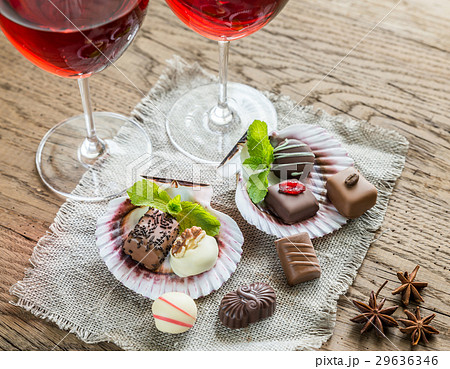 Luxury chocolate candies with two glasses of wine 29636346