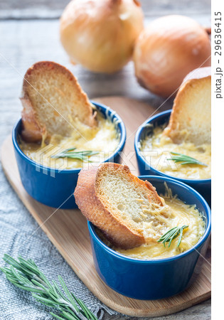 Bowls of onion soup on the wooden board 29636415