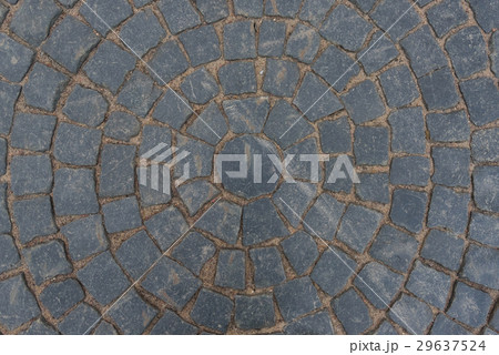 Gray paving stone paved with a pattern 29637524