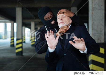 Angry aggressive man holding a knife 29637899