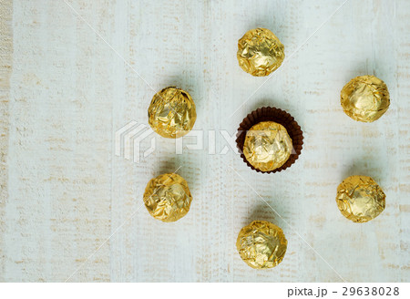 Chocolate ball wrapped in foil 29638028