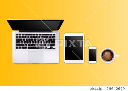 Laptop tablet smartphone  and coffee on yellow 29640699